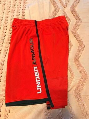 Under Armour boy’s Red Athletic Shorts with Black Trim